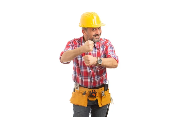 Construtor Sorridente Segurando Punhos Como Zombando Fazendo Gesto Ciumento Isolado — Fotografia de Stock