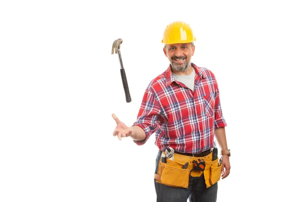 Sorrindo Construtor Masculino Jogando Martelo Como Truque Com Expressão Amigável — Fotografia de Stock