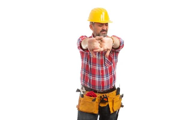 Builder snapping finger joints as stretching for hard-work concept isolated on white studio background