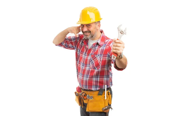 Friendly Constructor Making Phone Gesture Call Concept While Holding Wrench — Stock Photo, Image