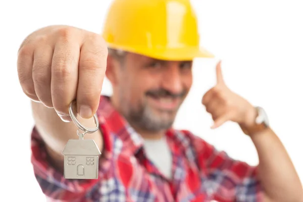 Construction Foreman Presenting House Shaped Silver Key Ring Making Call Stock Image