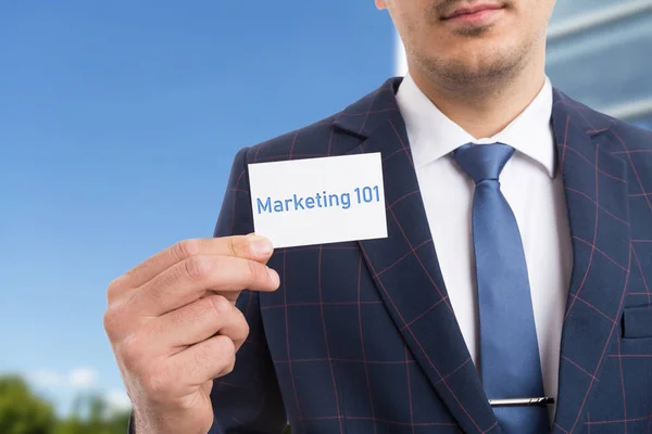 Man presenting marketing one-hundred and one by holding card in hand as must-know information concept