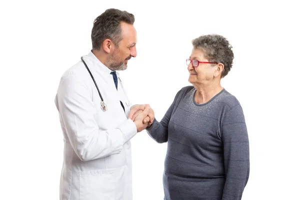 Sanitäter hält die Hand des Patienten — Stockfoto