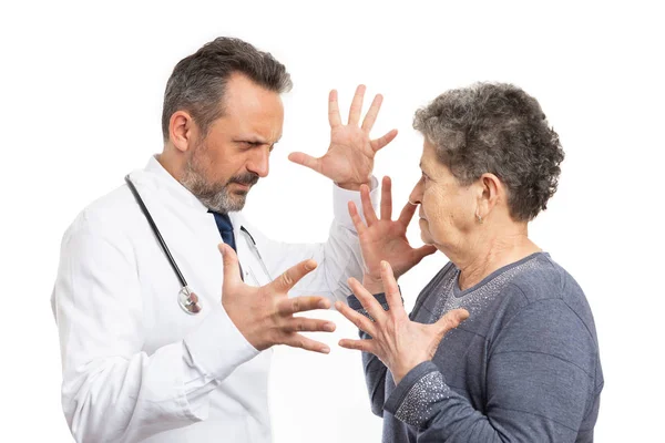 Medico e donna litigano — Foto Stock