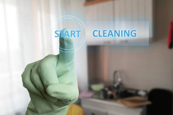 Person touching start cleaning button on screen — Stock Photo, Image