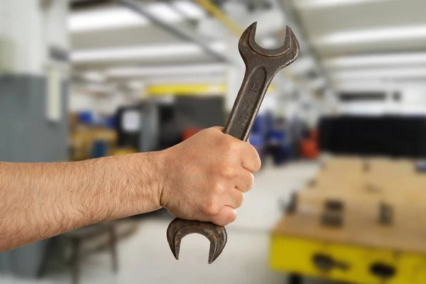 Closeup of wrench held by man — Stock Photo, Image