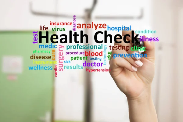 Nurse writing health check on screen — Stock Photo, Image