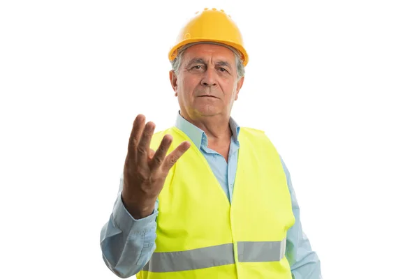Construtor masculino segurando dedos como número três — Fotografia de Stock