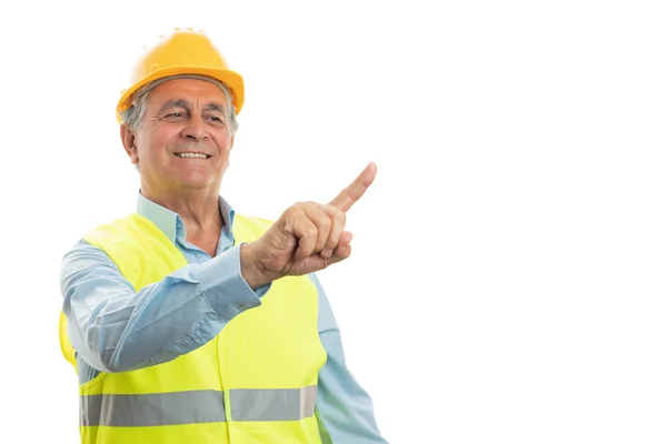 Mężczyzna budowniczy dotykając wyświetlacza — Zdjęcie stockowe
