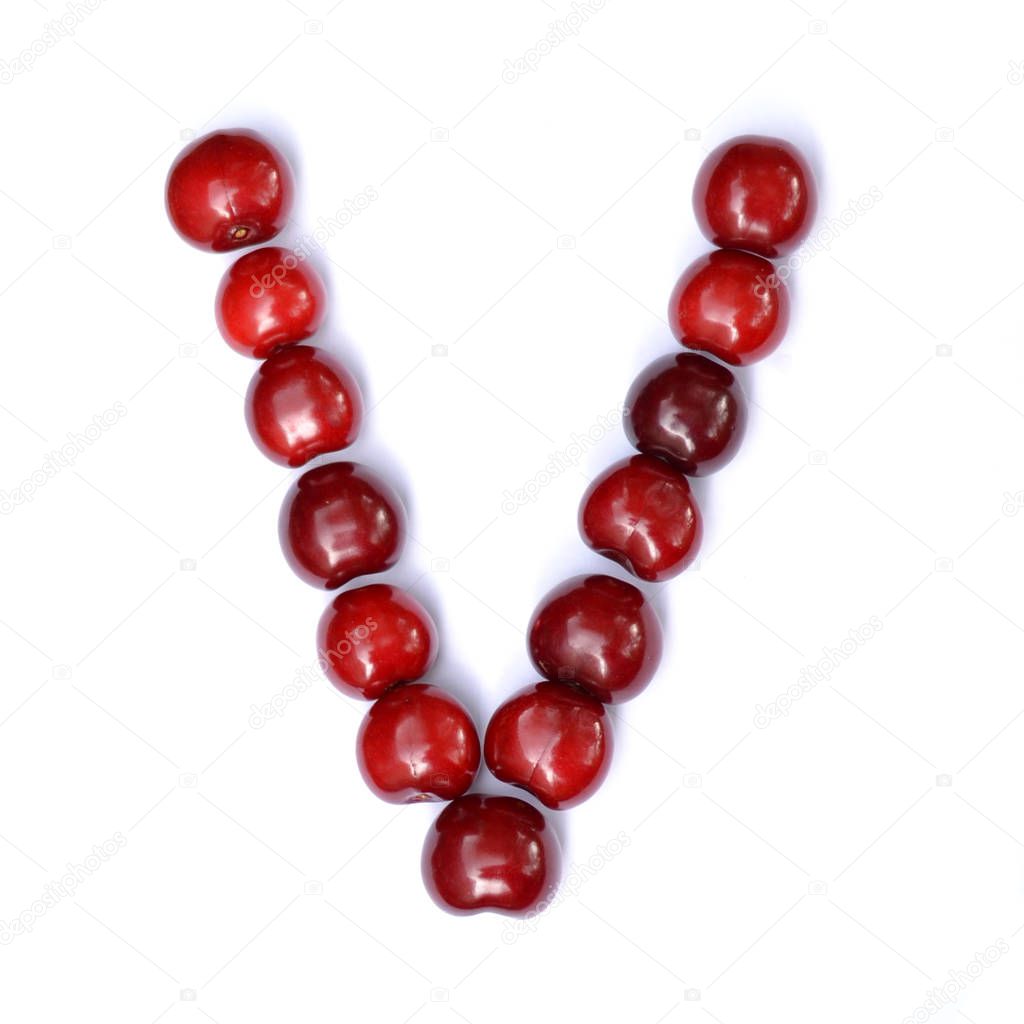 Letter V made with cherries to form a letter of the alphabet. Berry letters on a white background.