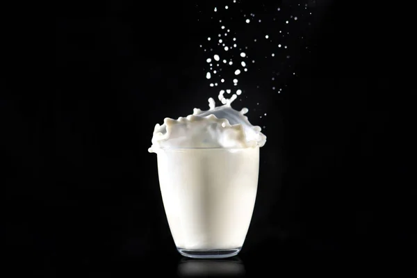 Milk Splashes Hat Made Glass Transparent Glass Black Background — Stock Photo, Image