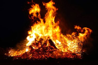 Large bonfire, burning and glowing with soft flames, sparkles fl clipart