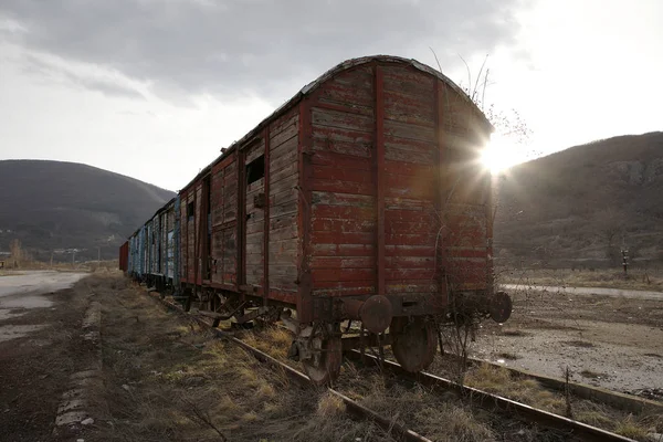 Old train wagons in an abandoned station