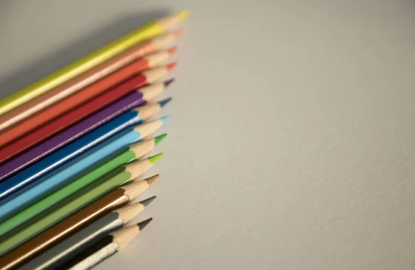 Color pencils form abstract lines pattern