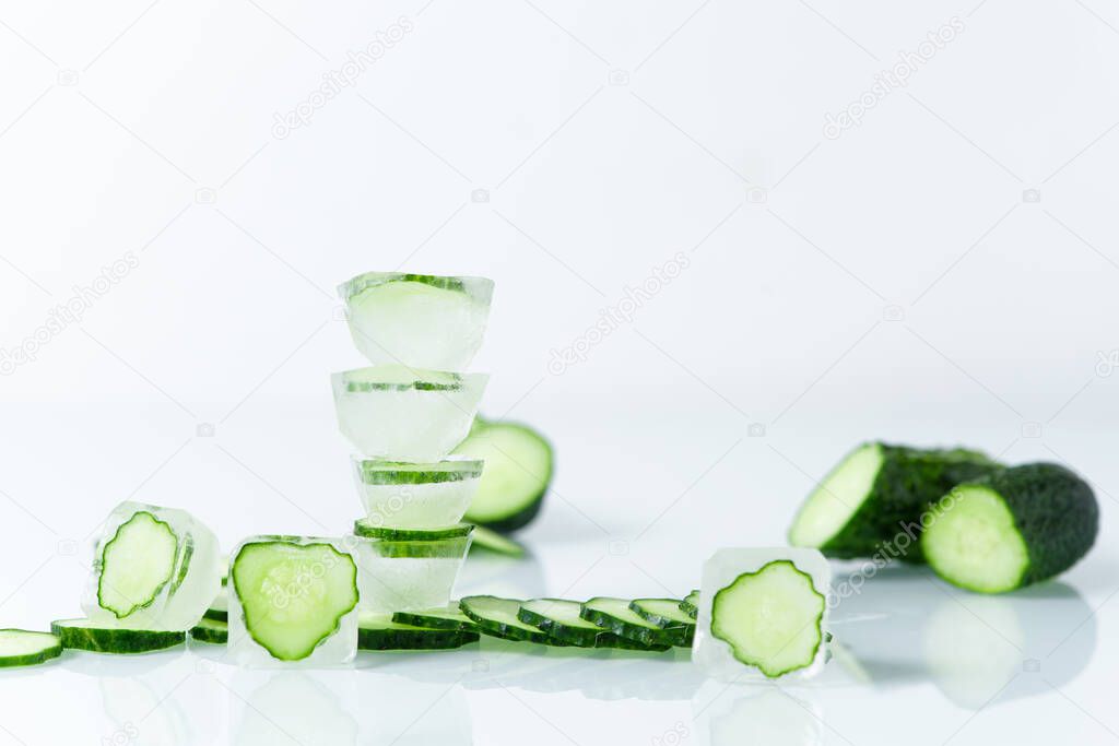 cosmetic ice cubes with cucumber for home face and body care, self-care, Spa treatments, skin detox, natural organic cosmetics at home.