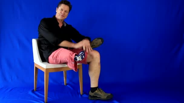 Handsome Man Handicapped Unprejudiced Goes Sits Chair Opens His Arms — Stock Video