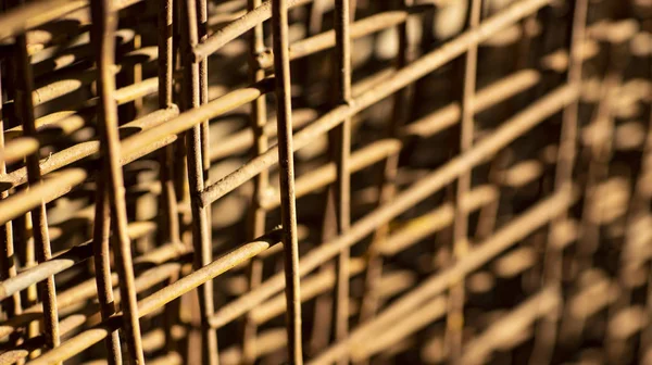 Rusty wire mesh background, blurred background