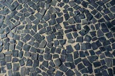 Rio de Janeiro, Brezilya için ünlü Copacabana plaj kaldırım döşemesi. Portekizce mozaik döşeme. Brezilyalı şehrin sokaklarında dekorasyon Soyut doku. 