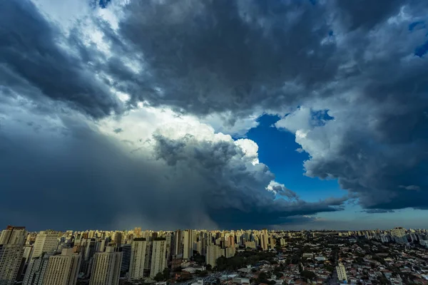Beautiful view of dramatic dark stormy sky. The rain is coming soon. Pattern of the clouds over city. Very heavy rain sky in Sao Paulo city, Brazil South America.