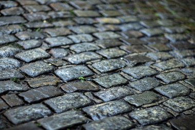 Taş kaldırım dokusu. Granit parke kaldırım arka plan. Arnavut kaldırımlı taş yol düzenli şekiller, eski parke taşı kaldırım yakın çekim soyut arka plan. 