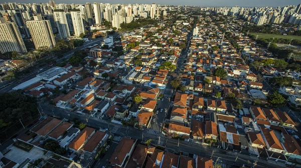 Roofs different from houses. View of the different red roofs of houses.