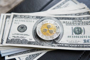 Kripto para birimi dalgalanma xrp ve dolar para arka plan ve defter. Blockchain ve siber para birimi. Küresel para. Exchange, ticaret, ticari. Nakit para ve cryptocurrency kavramı.