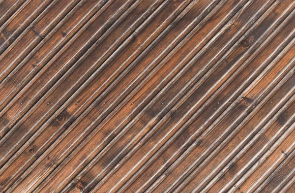 Staré hnědé dřevěné desky na pozadí textury, staré, loupání dřevěný plot pro návrháře. — Stock fotografie