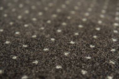 Kahverengi halı beyaz noktalar doku ile. Gün ışığı kapalı halı çekimi.