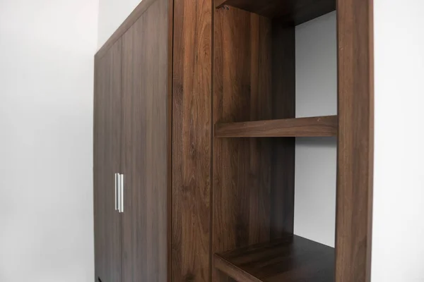 Modern brown wooden wardrobe in the room. — ストック写真