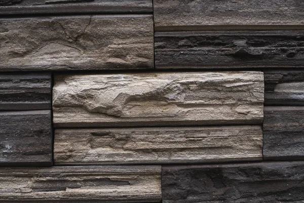 Naturalne cegły kamienne jako ozdoba na? cianie. Naturalna kamienna struktura ścian. Ściany są wykonane z kamieni lub kulki. Dekoracja ścian lub febry. — Zdjęcie stockowe