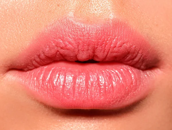 close-up view of female sensual pink lips