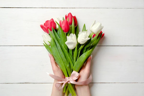 Bouquet Tulips Womans Hands White Wooden Background Greeting Card International — Stock Photo, Image