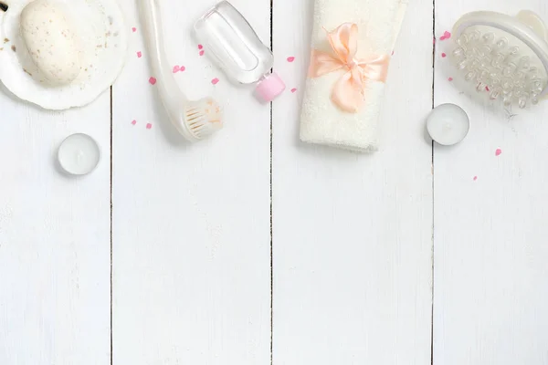 Frame or border of spa beauty cosmetics on white wooden table from above. Flat lay composition, top view, overhead — Stock Photo, Image