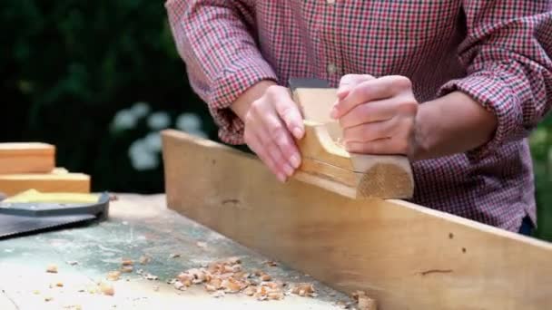 Caucasian Craftswoman Working Her Workshop Using Carpentry Plane Woodworking Concept — Stock Video