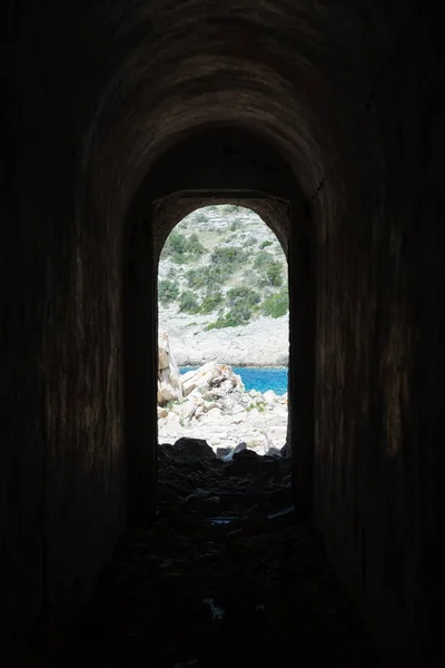 Looking out of corridor of an abandoned second world war bunker in Croatia — Stock Photo, Image