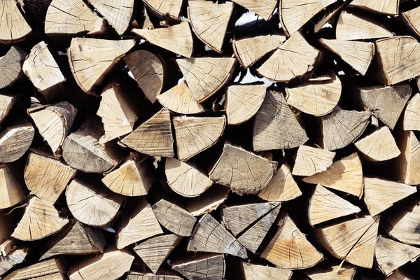 Neatly stacked cut and split spruce tree firewood viewed from front — Stock Photo, Image