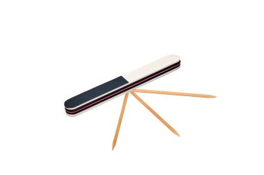 Nail file and nail sticks on white background clipart