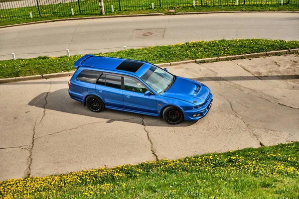 Aggressive sport car in blue against the background of nature — Stock Photo, Image