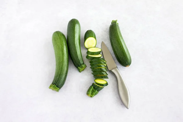 Whole Sliced Zucchini Knife Gray Background Lots Copy Space — Stock Photo, Image