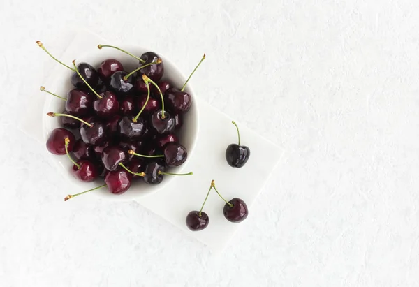 White Bowl Filled Fresh Cherries White Marble Board White Textured — Stock Photo, Image