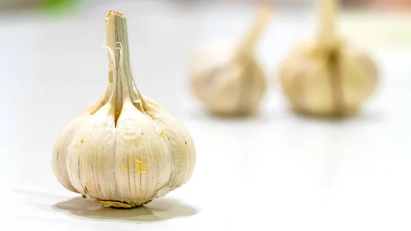 Isolated close up fresh garlic cloves 