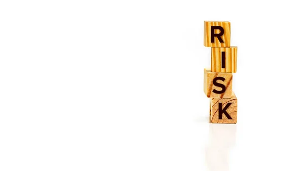 Close up Risk word on multi-colored wooden blocks — Stock Photo, Image