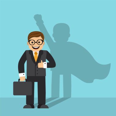 İşadamı duruyor ve onun gölgesi bir süper kahraman pelerin içinde duvardaki görülür