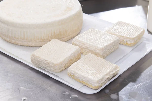 Fresh cheese ready for seasoning — Stock Photo, Image