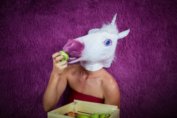 Freaky Young Woman Comical Mask Stands Purple Background Shows Box — Stock Photo, Image