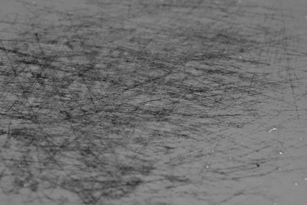 Scratches on a plastic board, background and texture