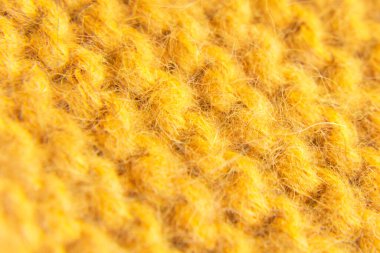 Örgü yün turuncu desenli. Örgü örüyorum. Yünlü arkaplan