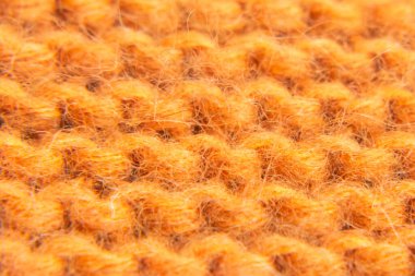 Örgü yün turuncu desenli. Örgü örüyorum. Yünlü arkaplan