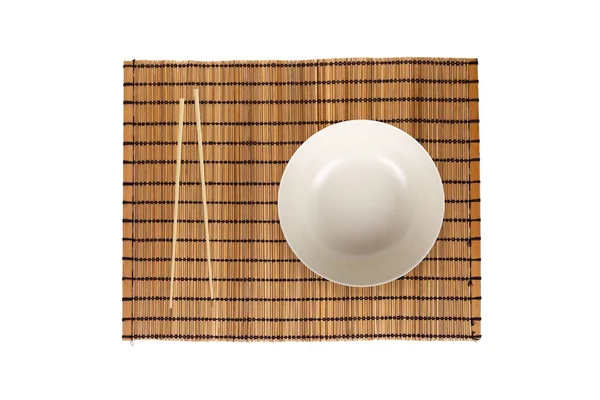 Top View Empty White Plate Chopsticks Wooden Place Mat Isolated — Stock Photo, Image