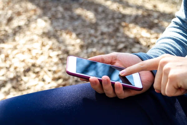 Hand Holding Phone with Black Screen Outdoor